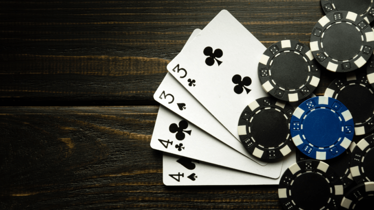 deck of cards and coins in casino