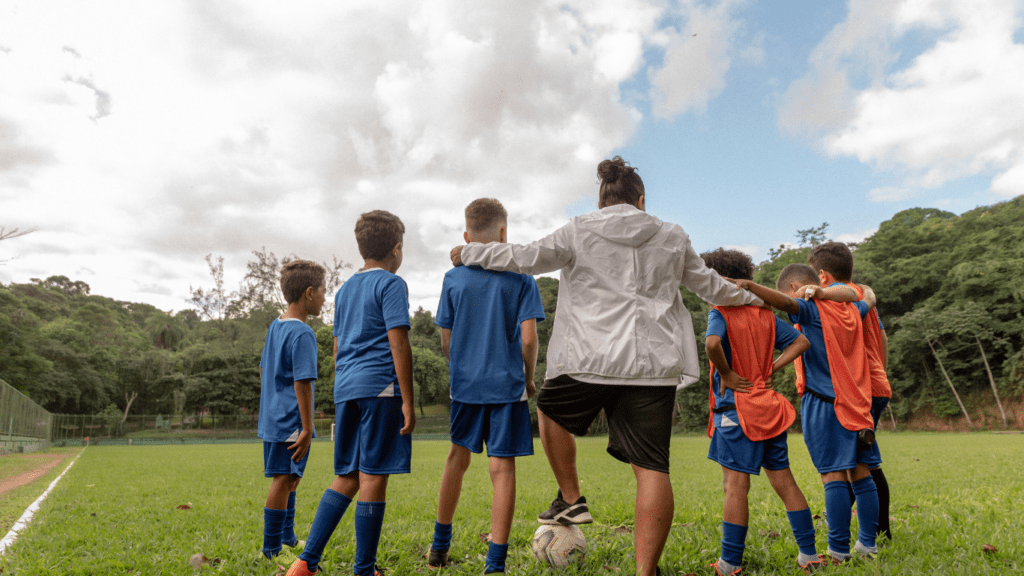 group of people in the soccer field